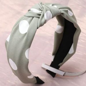 Green with white polka dot head band